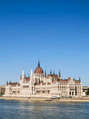 Fototapeta na wymiar Hungarian Parliament building in Budapest with blue sky background