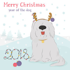 Christmas card with large, shaggy dog breed Bobtail with decorative reindeer and Christmas balls on a blue background with snow.