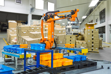 Controller of industrial robotic arm for performing, dispensing, material-handling and packaging applications in production line manufacturer factory.