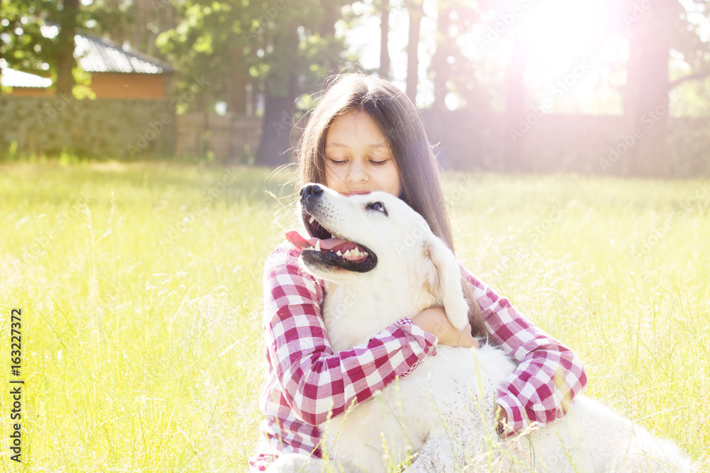 Poster girl hugging dog