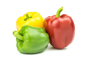 Plakat Red yellow green bell peppers vegetable isolated on a white background.