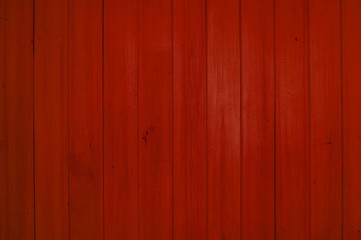 Fototapeta premium Rote alte Holzbretter