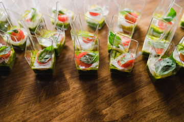 Catering banquet table at reception. Restaurant presentation, molecular gastronomy, haute cuisine,...
