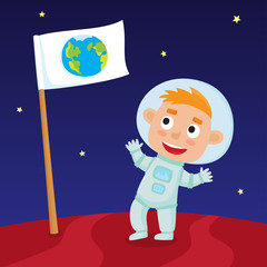 Cute little happy boy astronaut standing on Mars with Earth flag