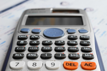 close up advance calculator for engineer or business on the finance/math paper.