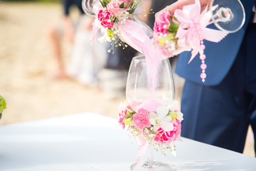 Bride and groom during pour sand ceremony