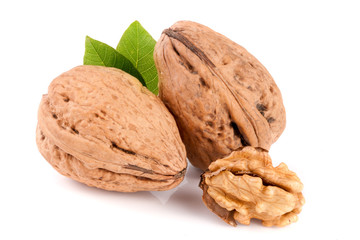 Walnuts with leaf isolated on white background