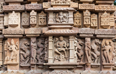 Ancient stone bas-relief at famous jain temple in Khajuraho, India