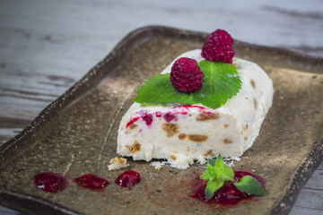 cut semifredo with berries and jam