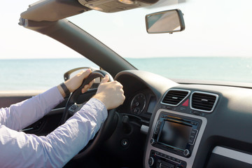 Fototapeta premium Man driving a car