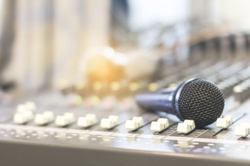 The microphone on the audio mixer. In the recording studio.