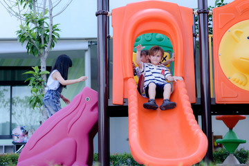 Fototapeta na wymiar group of international kids preschool enjoy playing in schoolyard together