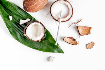 cocktail with coconut on white background top view