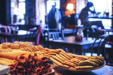 different types cookies on the counter in cafe