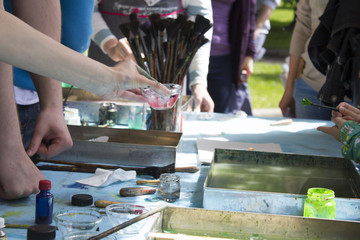 Ebru art. Traditional Turkish Ebru technique. Painting on water, followed by paper prints. Color paint ebru with waves and tile pattern.