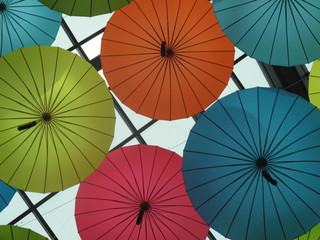 Colorful umbrellas hanging from the ceiling