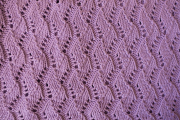 Pink handmade lacy knitted fabric from above