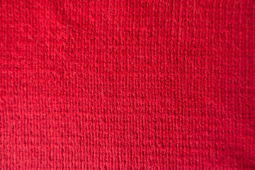 Close up of handmade crimson stockinet fabric