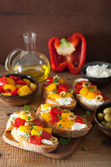 italian bruschetta with roasted peppers goat cheese olives