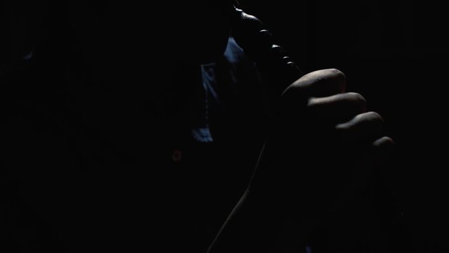 Young Woman Inhaling Hookah. Silhouette of Female Smoking Shisha.