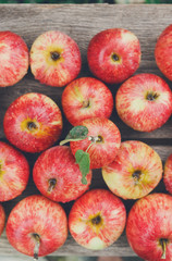 Sweet fresh ripe red apple harvest background