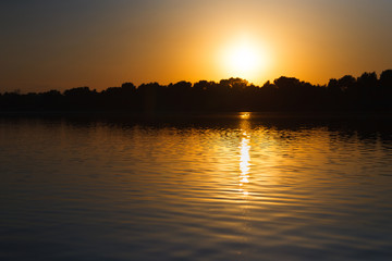 Sunset at water pond. Nature landscape background