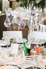 Restaurant table decorated for wedding celebration
