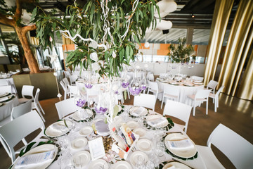 Restaurant table decorated for wedding celebration
