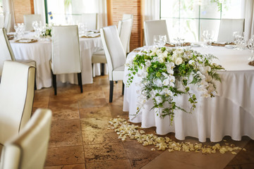 Restaurant round table decorated for wedding celebration