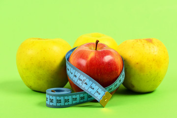 Apples in green color near red apple