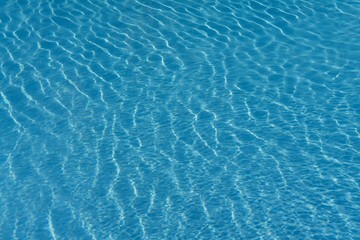 Blue ripped water in swimming pool