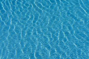 Blue ripped water in swimming pool