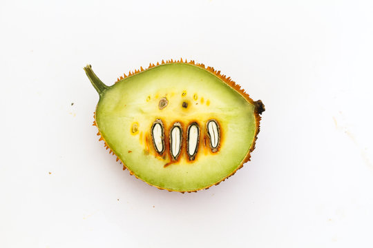 Gac Fruit Or Baby Jackfruit / Gac Fruit Or Baby Jackfruit With Half Cross Section Isolated On White Background.