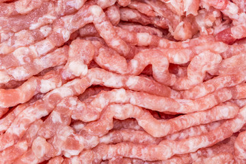 Detail of fresh and raw minced pork from supermarket, fresh food ingredients concept.