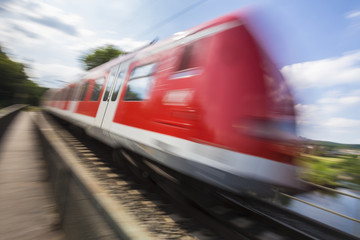 speed blurred passenger train outdoors