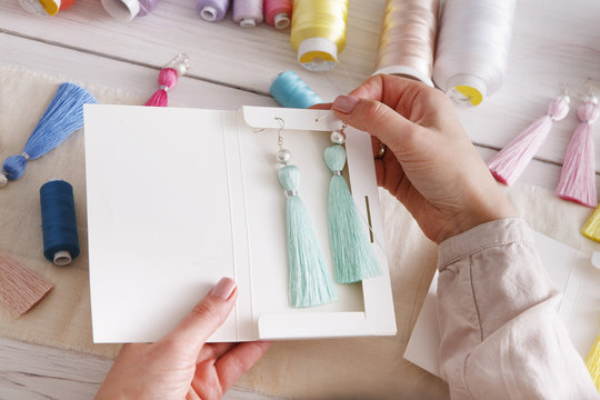 Handmade earrings packing, home workshop