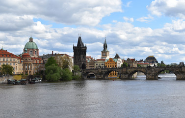 Fototapeta premium A view of Charles Bridge and the city center in Prague in Czech Republic.