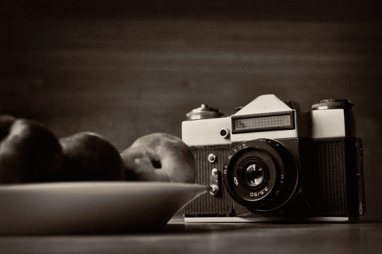 Old photo camera in black and white photo