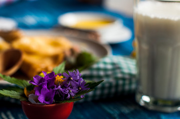 pancakes with honey syrup on a white plate. traditional crepe for pancake week or Shrovetide. crepes with roasted nuts
