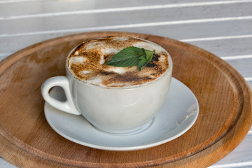 Coffee cup on table closeup