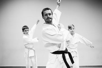 Children in kimono begin training on aikido