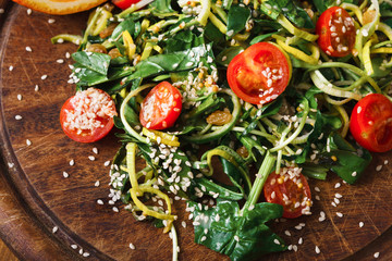 Restaurant dish - vegetable salad on rustic wood