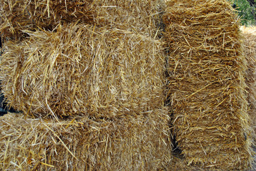 Close up of haystacks - agriculture and nature concept.
