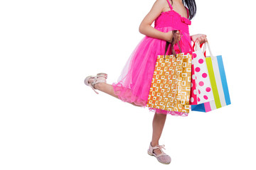 Asian Chinese little girl holding shopping bags