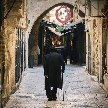 Orthodox Jewish man walks in Jerusalem's Jewish quarter
