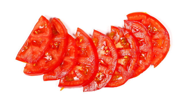 Fresh red tomato slices isolated on white background