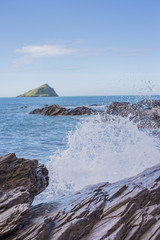 Breaking on the rocks