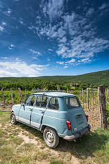Fototapeta premium Old car in vineyard and plantation in Slovenia