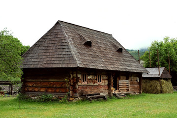 Fototapeta na wymiar Old fashioned traditional Carpathian wooden house