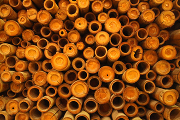 Fototapeta premium the ends of stacked and dried up cut bamboo background decoration closeup edition